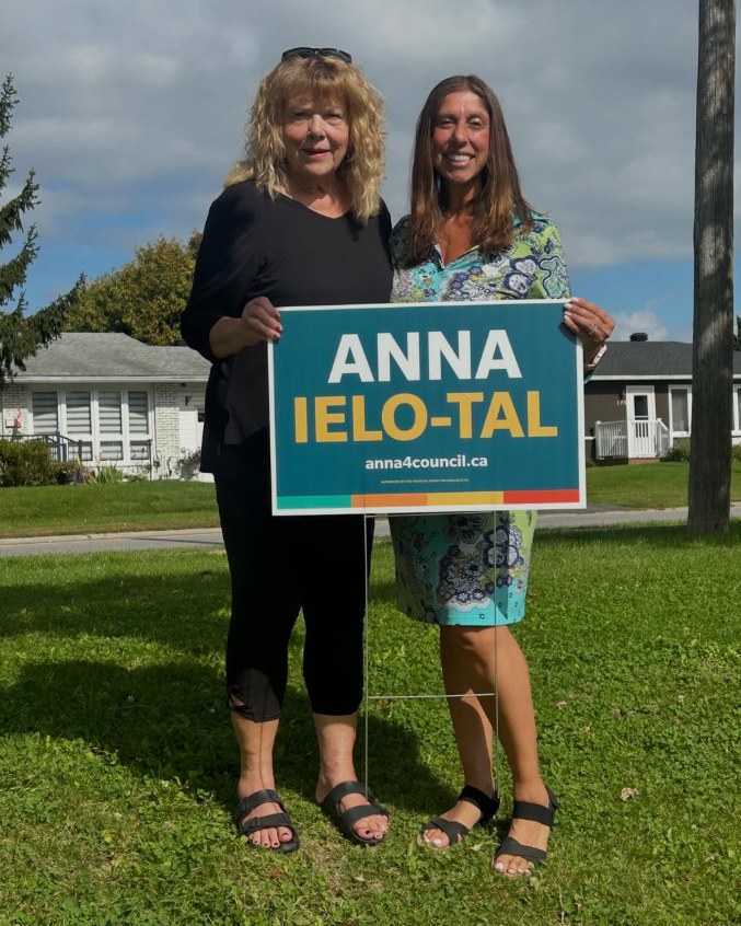 Jan Harder and Anna Ielo Tal poudly display an Anna lawn sign